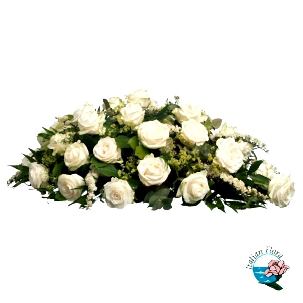 funeral spray of white roses