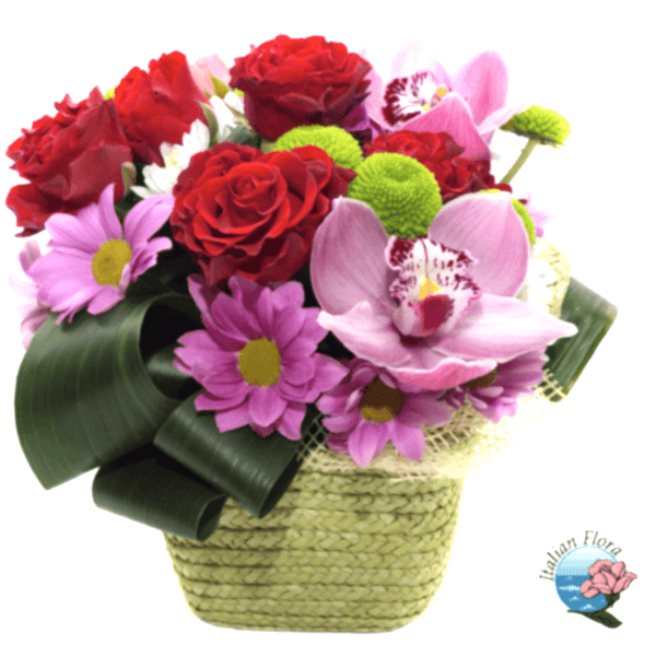 basket of red roses and pink flowers