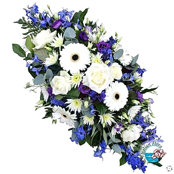 white and blue funeral arrangement